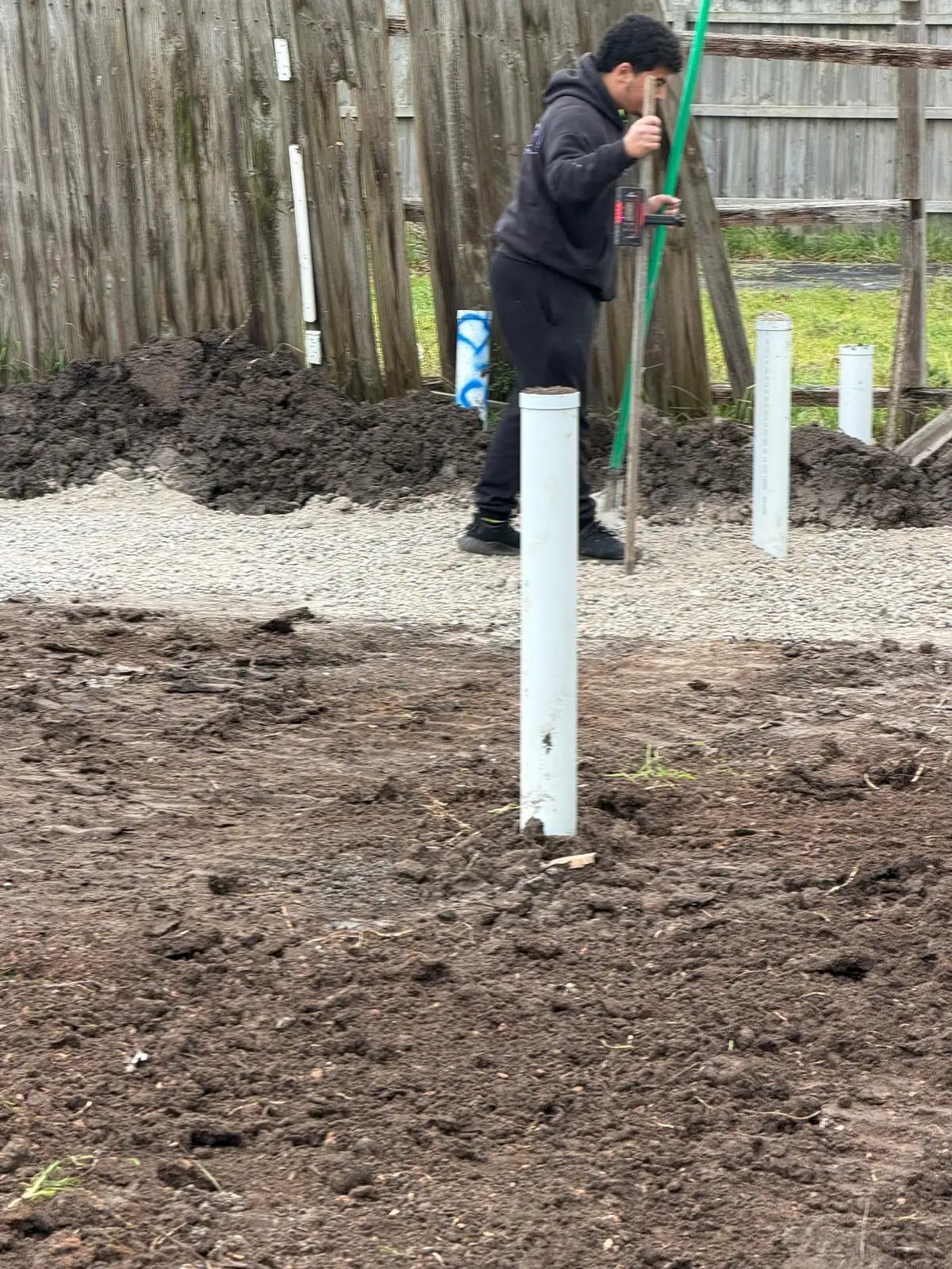 Plumbing risers in position and checked before the slab works