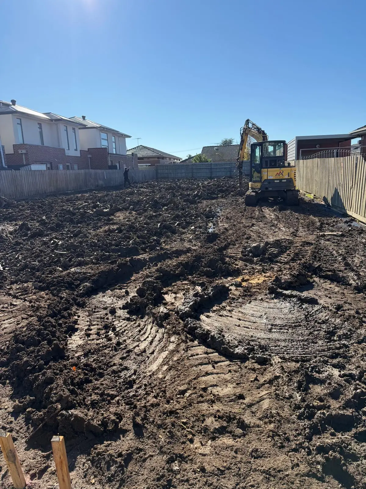 Cleared and excavated block before the slab