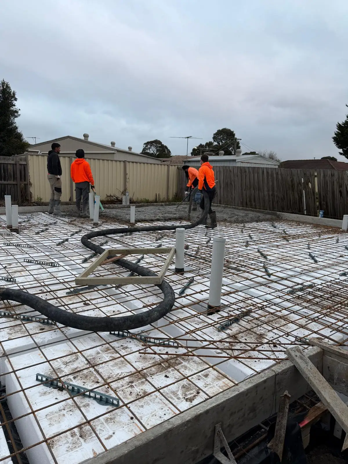 Slab reinforcement, pods and edge beams in place for a pre-pour check